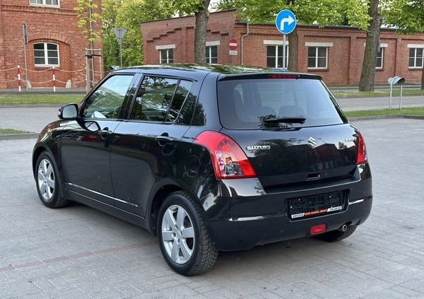 Suzuki Swift cena 16900 przebieg: 121000, rok produkcji 2009 z Gniezno małe 497
